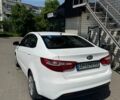 Білий Кіа Ріо, об'ємом двигуна 1.4 л та пробігом 221 тис. км за 5999 $, фото 5 на Automoto.ua