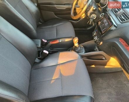 Білий Кіа Ріо, об'ємом двигуна 1.4 л та пробігом 160 тис. км за 7700 $, фото 10 на Automoto.ua