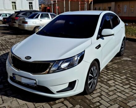 Белый Киа Рио, объемом двигателя 1.4 л и пробегом 87 тыс. км за 8750 $, фото 4 на Automoto.ua
