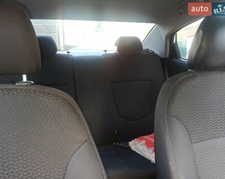 Белый Киа Рио, объемом двигателя 1.4 л и пробегом 156 тыс. км за 6300 $, фото 3 на Automoto.ua