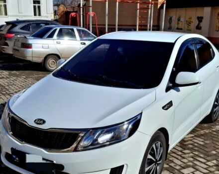 Белый Киа Рио, объемом двигателя 1.4 л и пробегом 87 тыс. км за 8750 $, фото 1 на Automoto.ua