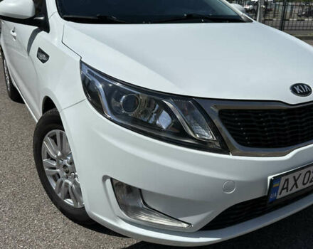 Білий Кіа Ріо, об'ємом двигуна 1.4 л та пробігом 184 тис. км за 7900 $, фото 11 на Automoto.ua