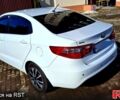 Білий Кіа Ріо, об'ємом двигуна 1.4 л та пробігом 87 тис. км за 8750 $, фото 3 на Automoto.ua