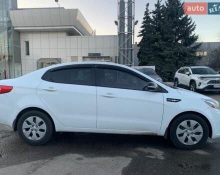 Белый Киа Рио, объемом двигателя 1.4 л и пробегом 216 тыс. км за 8555 $, фото 1 на Automoto.ua