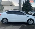 Белый Киа Рио, объемом двигателя 1.4 л и пробегом 216 тыс. км за 8555 $, фото 1 на Automoto.ua