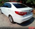 Білий Кіа Ріо, об'ємом двигуна 1.4 л та пробігом 213 тис. км за 7800 $, фото 5 на Automoto.ua