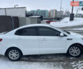 Білий Кіа Ріо, об'ємом двигуна 1.4 л та пробігом 216 тис. км за 7850 $, фото 19 на Automoto.ua