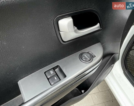 Білий Кіа Ріо, об'ємом двигуна 1.4 л та пробігом 210 тис. км за 6050 $, фото 13 на Automoto.ua