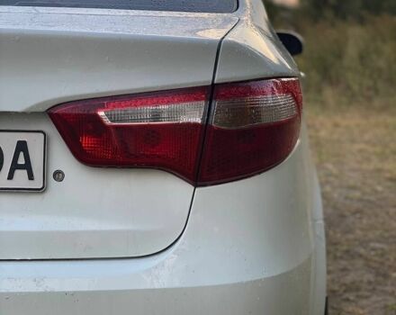 Білий Кіа Ріо, об'ємом двигуна 1.4 л та пробігом 258 тис. км за 6200 $, фото 12 на Automoto.ua