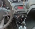 Белый Киа Рио, объемом двигателя 1.4 л и пробегом 180 тыс. км за 8000 $, фото 3 на Automoto.ua