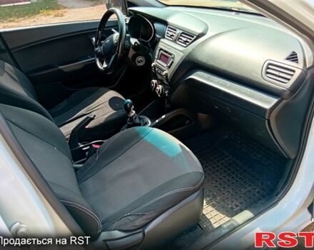 Білий Кіа Ріо, об'ємом двигуна 1.4 л та пробігом 213 тис. км за 7800 $, фото 6 на Automoto.ua