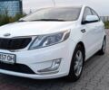 Білий Кіа Ріо, об'ємом двигуна 1.4 л та пробігом 99 тис. км за 9000 $, фото 1 на Automoto.ua