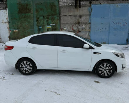 Белый Киа Рио, объемом двигателя 1.4 л и пробегом 211 тыс. км за 6950 $, фото 4 на Automoto.ua