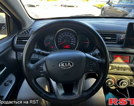 Белый Киа Рио, объемом двигателя 1.4 л и пробегом 214 тыс. км за 8300 $, фото 7 на Automoto.ua