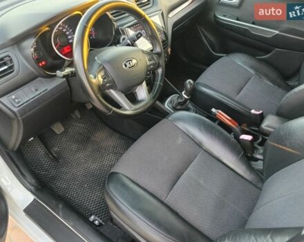 Білий Кіа Ріо, об'ємом двигуна 1.4 л та пробігом 160 тис. км за 7700 $, фото 9 на Automoto.ua