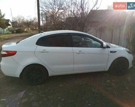 Білий Кіа Ріо, об'ємом двигуна 1.4 л та пробігом 87 тис. км за 8000 $, фото 1 на Automoto.ua