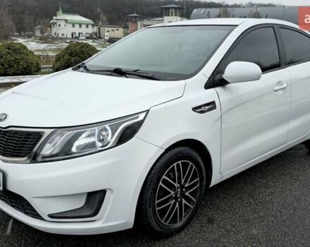 Білий Кіа Ріо, об'ємом двигуна 1.4 л та пробігом 124 тис. км за 7199 $, фото 14 на Automoto.ua