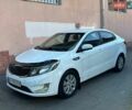 Білий Кіа Ріо, об'ємом двигуна 1.4 л та пробігом 214 тис. км за 6600 $, фото 1 на Automoto.ua
