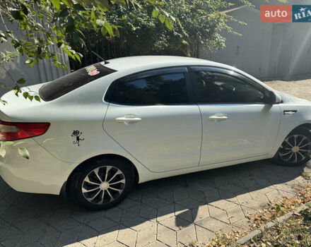 Білий Кіа Ріо, об'ємом двигуна 1.4 л та пробігом 84 тис. км за 9200 $, фото 2 на Automoto.ua