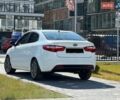 Білий Кіа Ріо, об'ємом двигуна 1.4 л та пробігом 274 тис. км за 6000 $, фото 10 на Automoto.ua