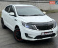 Белый Киа Рио, объемом двигателя 1.4 л и пробегом 246 тыс. км за 6550 $, фото 1 на Automoto.ua