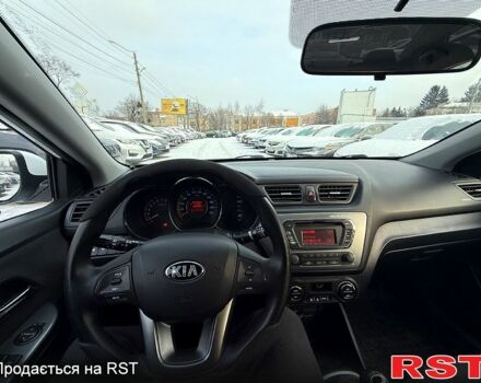 Білий Кіа Ріо, об'ємом двигуна 1.6 л та пробігом 14800 тис. км за 7800 $, фото 11 на Automoto.ua