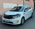 Білий Кіа Ріо, об'ємом двигуна 1.4 л та пробігом 214 тис. км за 6600 $, фото 1 на Automoto.ua