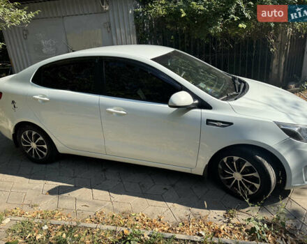 Білий Кіа Ріо, об'ємом двигуна 1.4 л та пробігом 84 тис. км за 9200 $, фото 3 на Automoto.ua