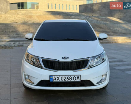 Белый Киа Рио, объемом двигателя 1.4 л и пробегом 185 тыс. км за 6700 $, фото 1 на Automoto.ua