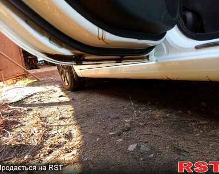 Білий Кіа Ріо, об'ємом двигуна 1.4 л та пробігом 870 тис. км за 7500 $, фото 8 на Automoto.ua