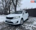 Білий Кіа Ріо, об'ємом двигуна 1.4 л та пробігом 216 тис. км за 7850 $, фото 1 на Automoto.ua