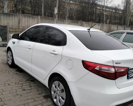 Білий Кіа Ріо, об'ємом двигуна 1.4 л та пробігом 84 тис. км за 8200 $, фото 15 на Automoto.ua