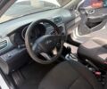 Белый Киа Рио, объемом двигателя 1.4 л и пробегом 143 тыс. км за 9199 $, фото 9 на Automoto.ua