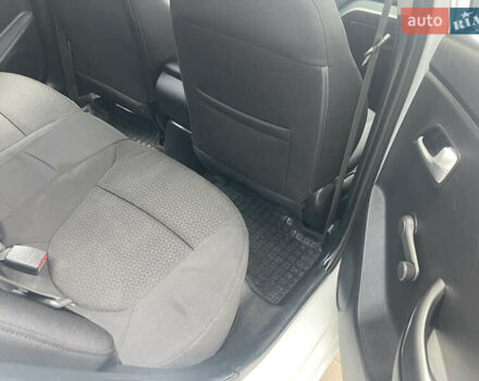 Білий Кіа Ріо, об'ємом двигуна 1.4 л та пробігом 141 тис. км за 6500 $, фото 10 на Automoto.ua