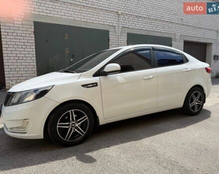 Белый Киа Рио, объемом двигателя 1.4 л и пробегом 143 тыс. км за 9199 $, фото 1 на Automoto.ua