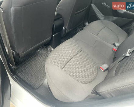 Білий Кіа Ріо, об'ємом двигуна 1.4 л та пробігом 141 тис. км за 6500 $, фото 9 на Automoto.ua