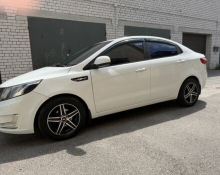 Белый Киа Рио, объемом двигателя 1.4 л и пробегом 143 тыс. км за 8917 $, фото 1 на Automoto.ua