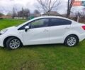 Белый Киа Рио, объемом двигателя 1.25 л и пробегом 85 тыс. км за 7600 $, фото 1 на Automoto.ua
