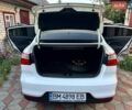 Білий Кіа Ріо, об'ємом двигуна 1.6 л та пробігом 140 тис. км за 7900 $, фото 9 на Automoto.ua