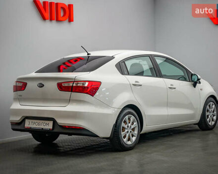 Білий Кіа Ріо, об'ємом двигуна 1.4 л та пробігом 193 тис. км за 9864 $, фото 1 на Automoto.ua