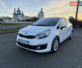 Білий Кіа Ріо, об'ємом двигуна 1.4 л та пробігом 132 тис. км за 9300 $, фото 1 на Automoto.ua