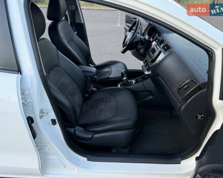 Білий Кіа Ріо, об'ємом двигуна 1.4 л та пробігом 132 тис. км за 9300 $, фото 18 на Automoto.ua