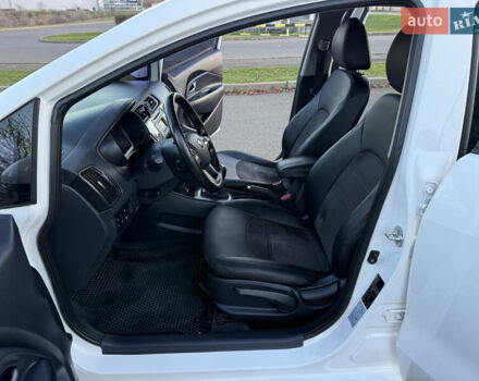 Білий Кіа Ріо, об'ємом двигуна 1.4 л та пробігом 132 тис. км за 9300 $, фото 9 на Automoto.ua