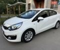 Белый Киа Рио, объемом двигателя 1.4 л и пробегом 99 тыс. км за 10450 $, фото 1 на Automoto.ua