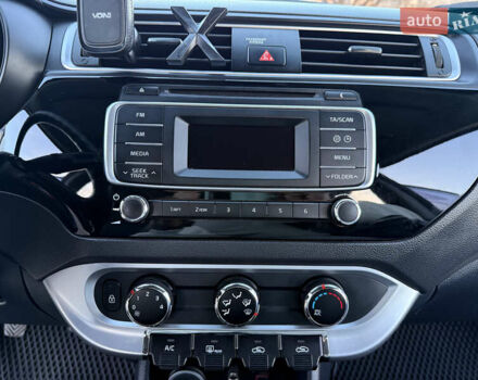 Білий Кіа Ріо, об'ємом двигуна 1.4 л та пробігом 132 тис. км за 9300 $, фото 13 на Automoto.ua