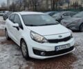 Білий Кіа Ріо, об'ємом двигуна 1.4 л та пробігом 182 тис. км за 10500 $, фото 1 на Automoto.ua