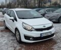 Білий Кіа Ріо, об'ємом двигуна 1.4 л та пробігом 182 тис. км за 9999 $, фото 1 на Automoto.ua