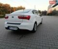 Білий Кіа Ріо, об'ємом двигуна 1.4 л та пробігом 49 тис. км за 10600 $, фото 2 на Automoto.ua