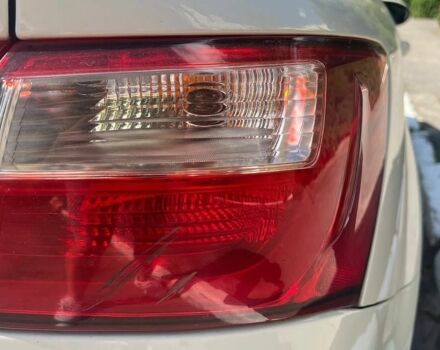 Білий Кіа Ріо, об'ємом двигуна 1.4 л та пробігом 49 тис. км за 10300 $, фото 10 на Automoto.ua