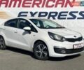 Білий Кіа Ріо, об'ємом двигуна 1.4 л та пробігом 88 тис. км за 8490 $, фото 1 на Automoto.ua
